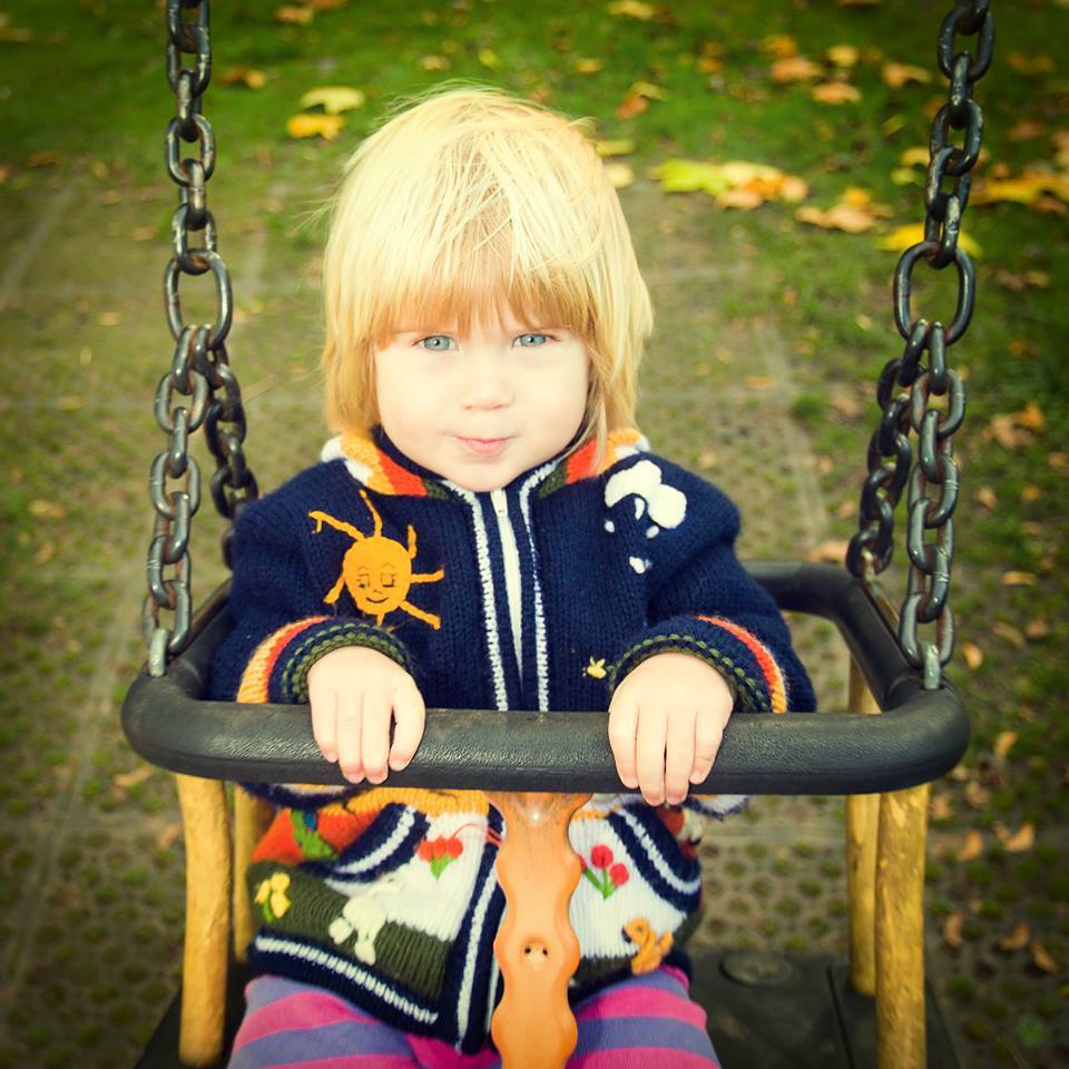 Toddler on a swing