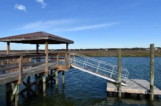 Covered Pier with Gangway to Floating Dock in Garden City Beach, SC