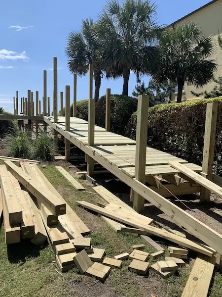 Dune crossover walkway ADA compliant with rails in Charlestowne Grant-Litchfield By The Sea by Waterbridge Contractors of the Carolinas