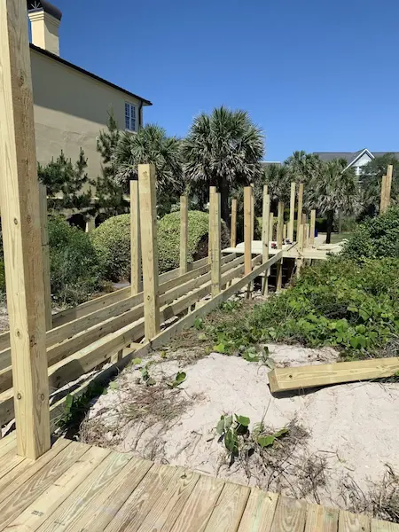 Dune crossover walkway ADA compliant with rails in Charlestowne Grant-Litchfield By The Sea by Waterbridge Contractors of the Carolinas
