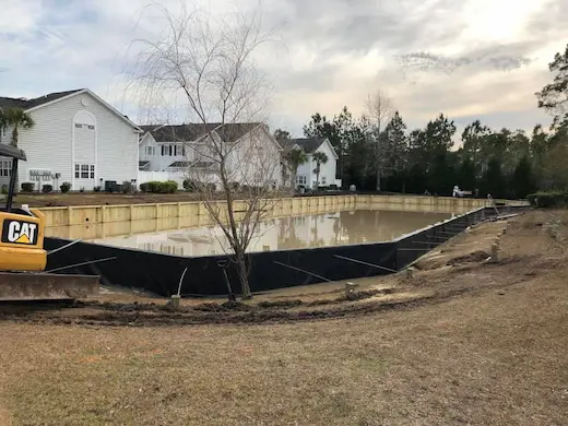 Retention pond construction at The Villas in Murrells Inlet, SC built by Waterbridge Contractors of the Carolinas