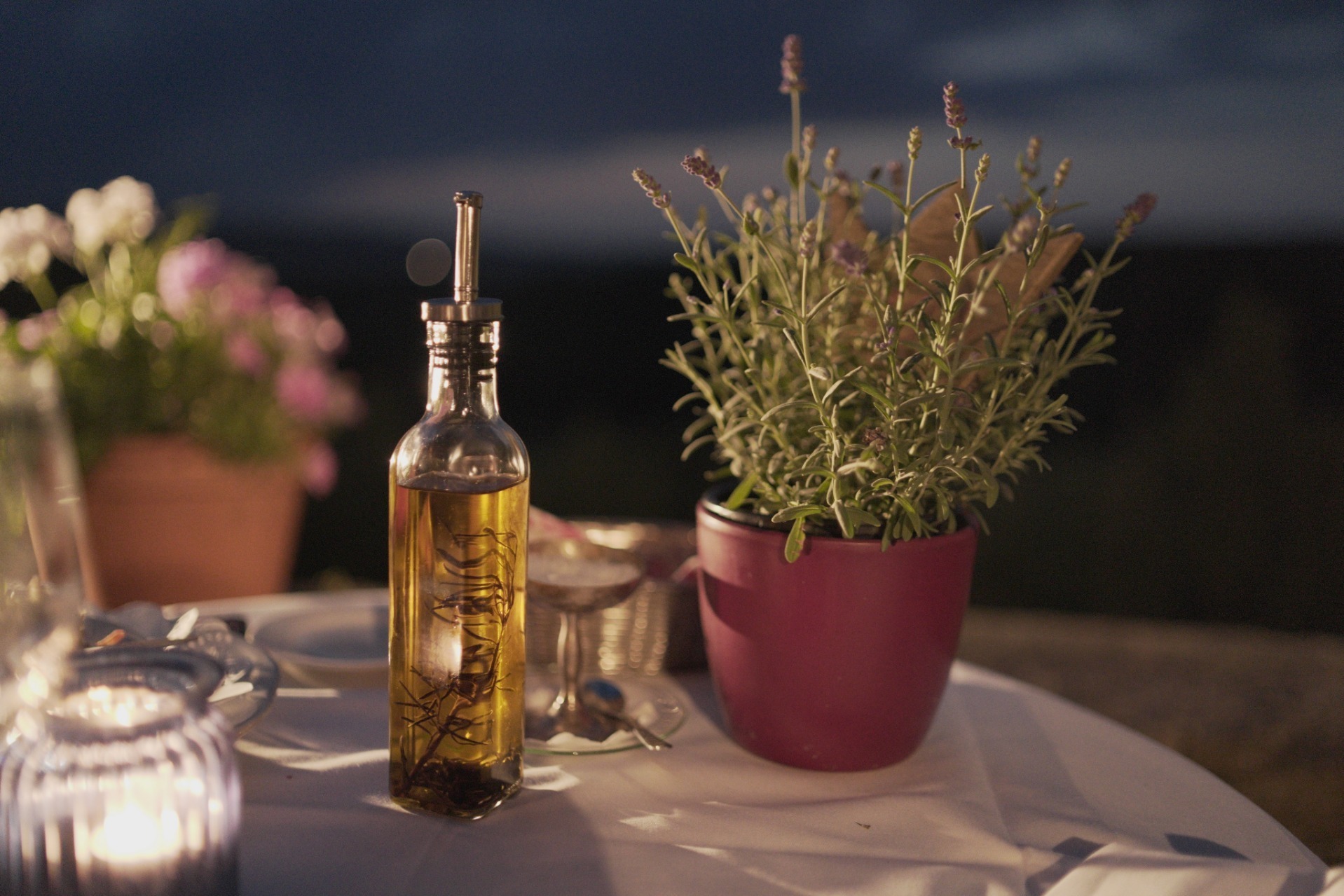 A bottle of Extra Virgin Olive Oil on a table ready to be eaten as a Superfood.