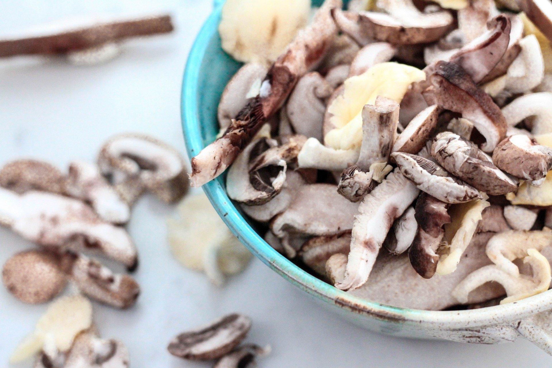 Overflowing bowl of sliced Mushrooms ready to be cooked is a Superfood that it is.