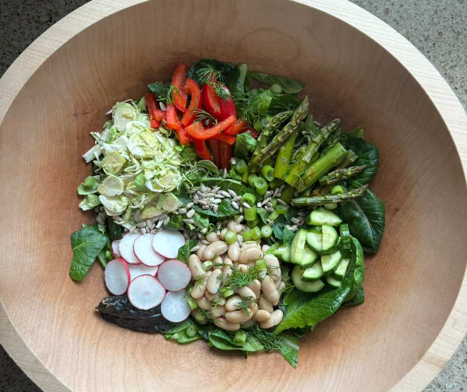 Lemon-Dill Asparagus and White Bean Salad of the Week bowl with roasted asparagus, white beans, fresh vegetables, and creamy lemon-Dijon tahini dressing