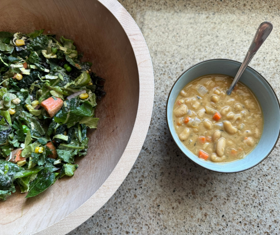 Roasted sweet potato garden bowl served with white bean and herb soup for a simple plant-based meal
