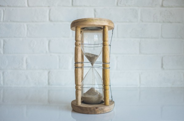 Hourglass of time. There is no urgency when you become a blogger and are your own boss.