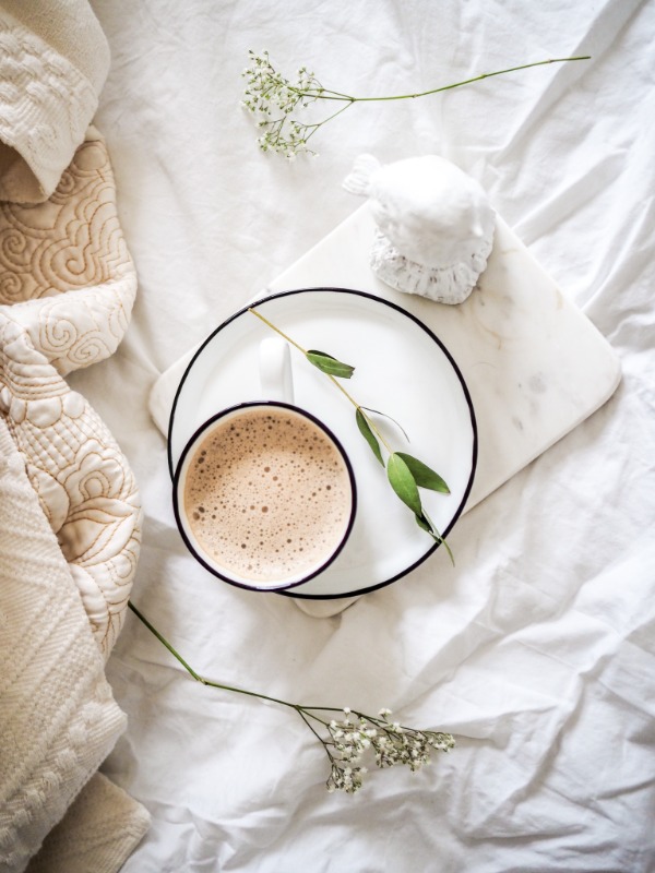 coffee on a white tablecloth. Better health and a sense of feeling refreshed when you do not have others dictating your schedule.