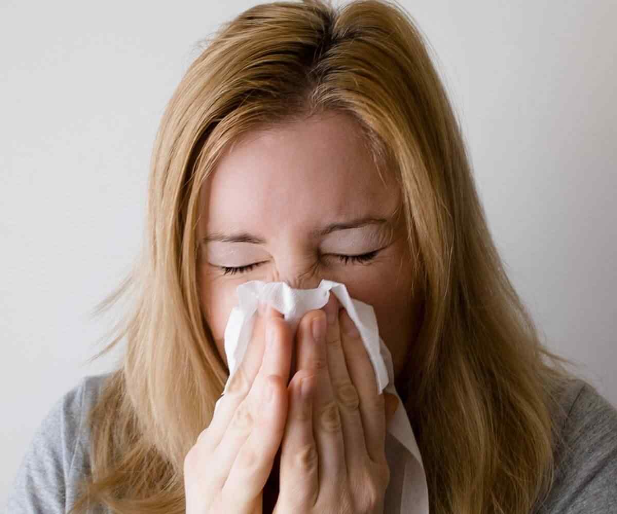 sin or slim woman sneezing, keto flu symptoms