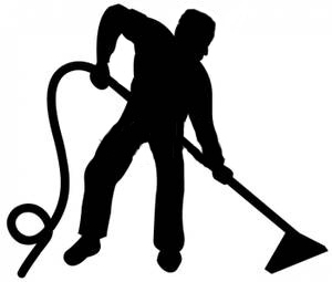 silhouette of man cleaning carpet