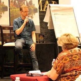 Jason speaking at a mastermind event in Costa Rica