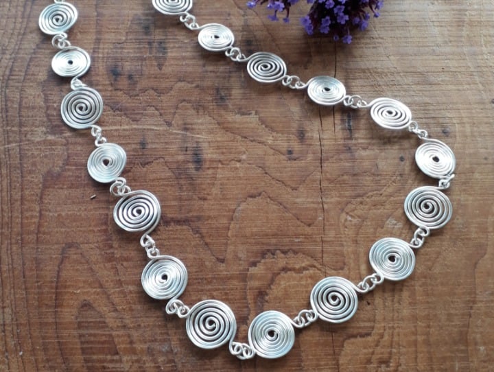 Open and Closed Silver Spiral Neckalces