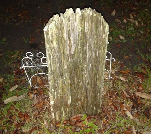 Old, rotting headstone made from Cypress Tree wood in Orlando's oldest cemetery, Greenwood Cemetery